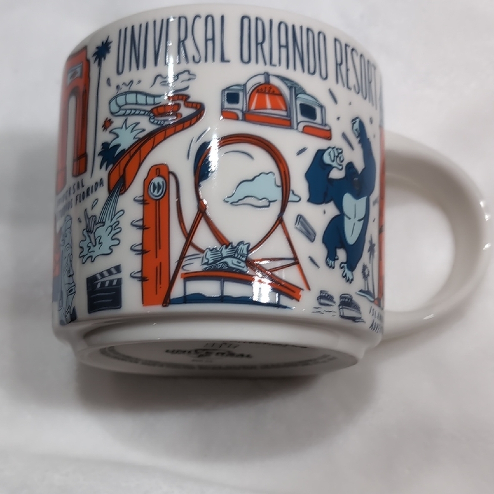 Universal Orlando Resort Mug - White, Orange, and Blue